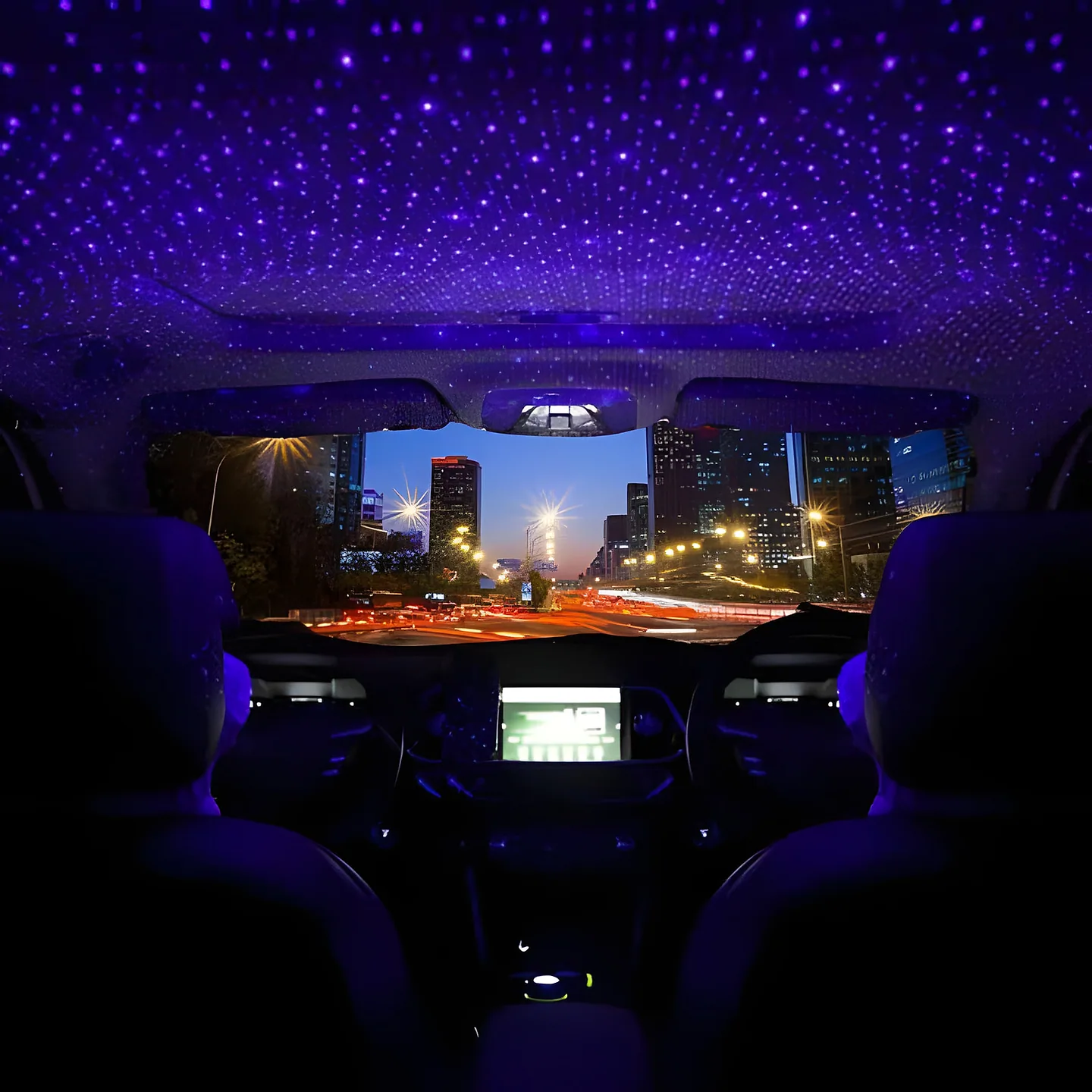 Car roof lining lit with hundreds of small purple and white points of light