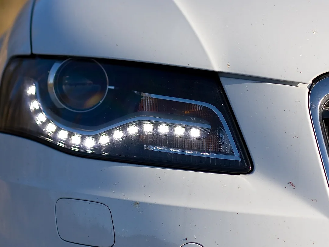 A row of LED daytime running lights in a car's headlamp